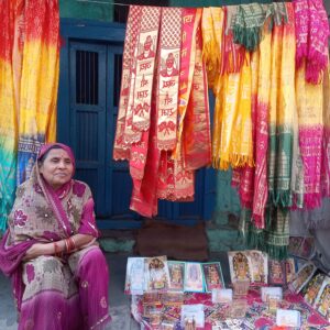 A woman selling souvenirs in Ayodhya, Uttar Pradesh